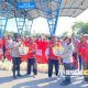 Pemberian bantuan Polwan Polres Nganjuk berupa sembako kepada pedagang asongan, tukang becak, ojek yang mangkal di terminal bus.