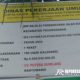 Papan nama pekerjaan proyek Pembangunan Jalan Sukomade di Kecamatan Pesanggaran, Banyuwangi,