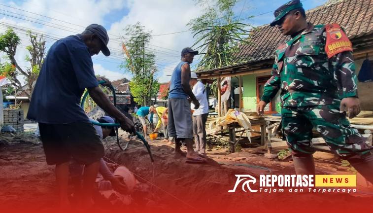 Kegiatan kerja bakti pembuatan jalan menuju Pemakaman Umum