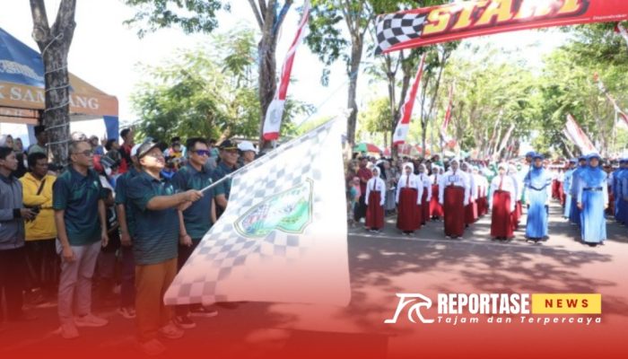 Semarak HUT RI ke-79, Pj Bupati Sampang Lepas Lomba Gerak Jalan Tingkat SD
